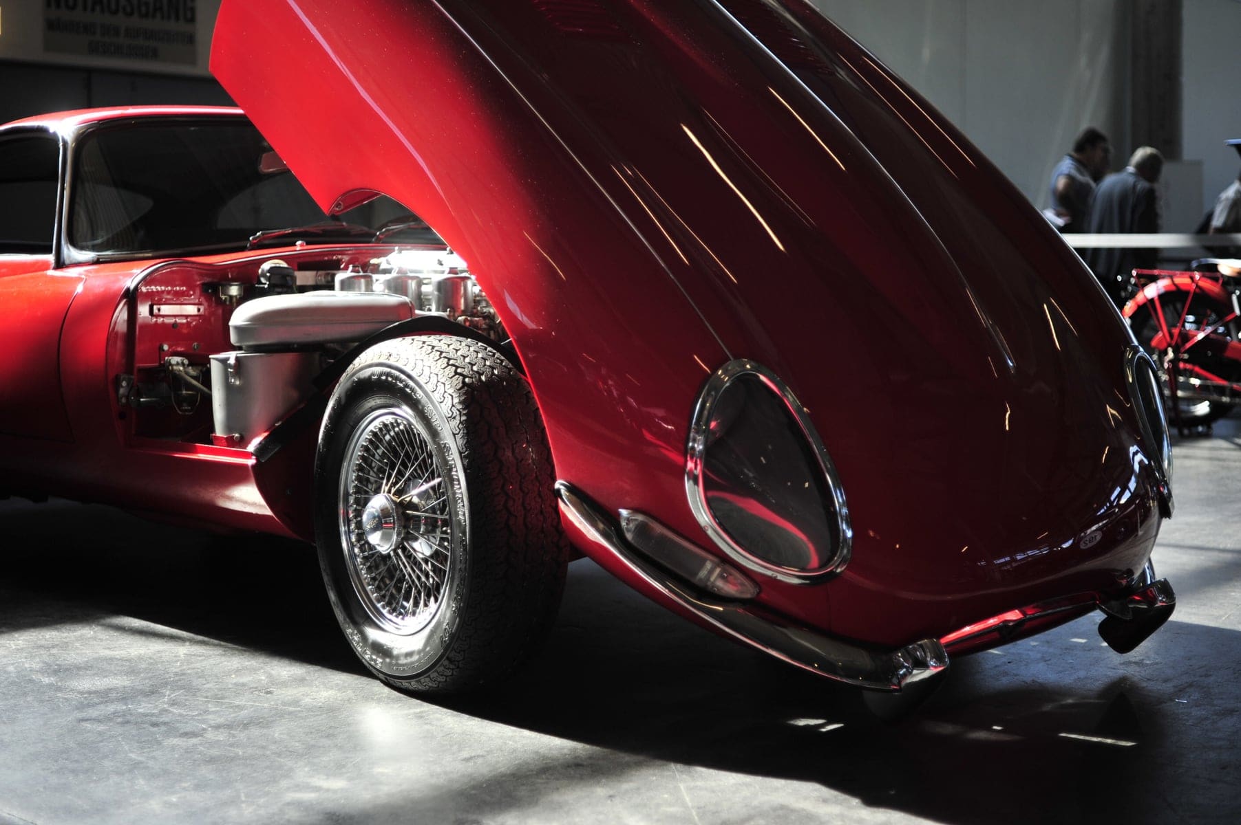 Red Jaguar E Type with lifted bonnet