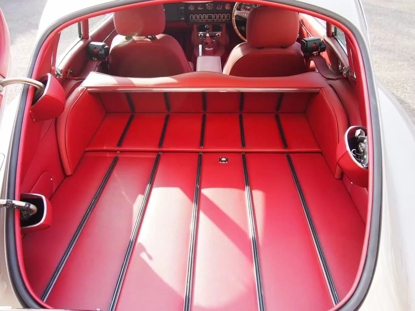 Red leather lined boot and interior of Jaguar E Type S2