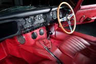 Red interior trim and leather seats of Jaguar E Type S1 - Demonstrator