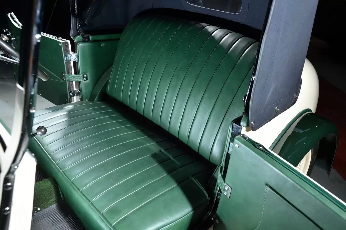 Green leather seats inside Austin 7 Swallow