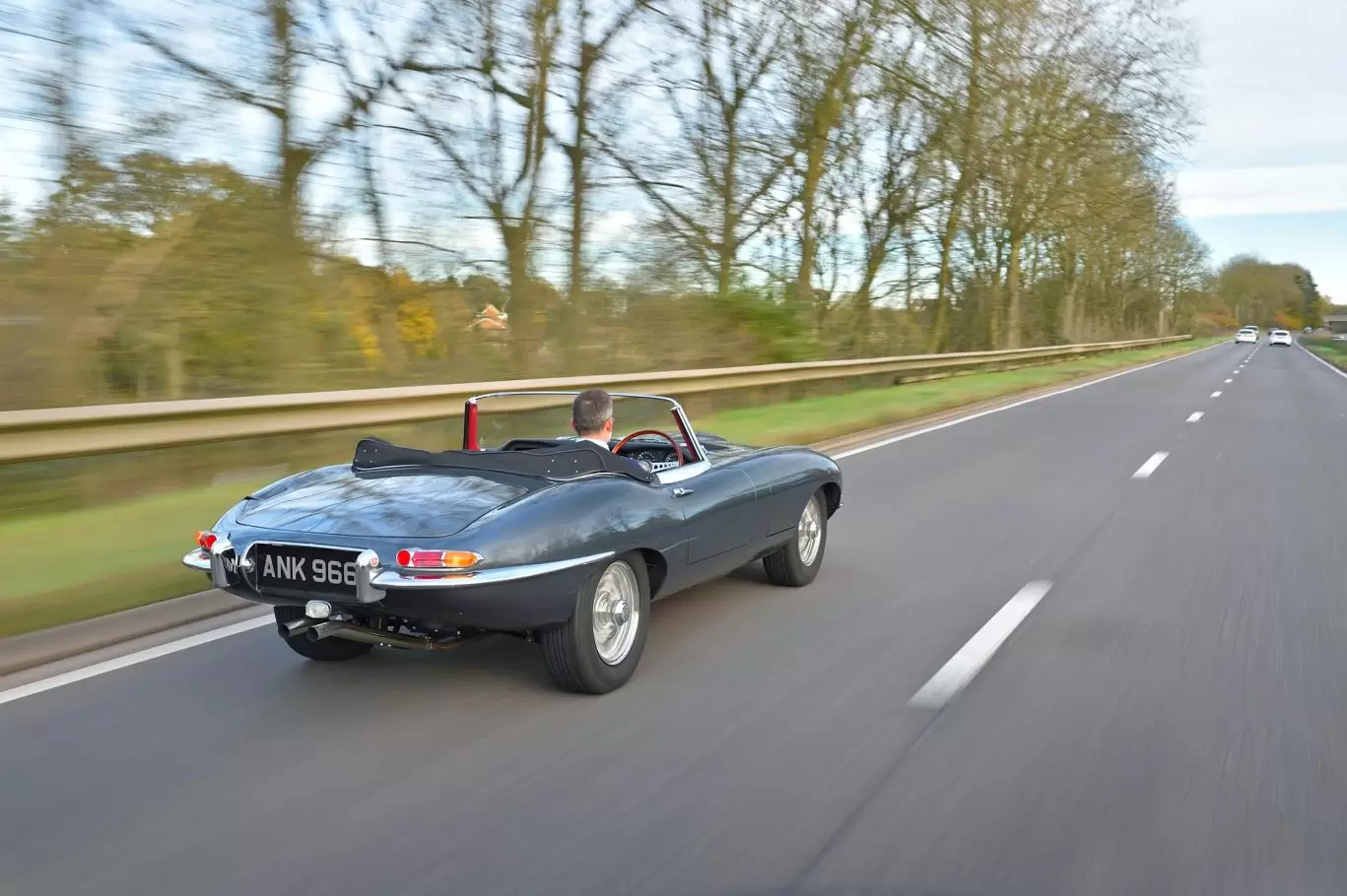 Classic car driving on the road