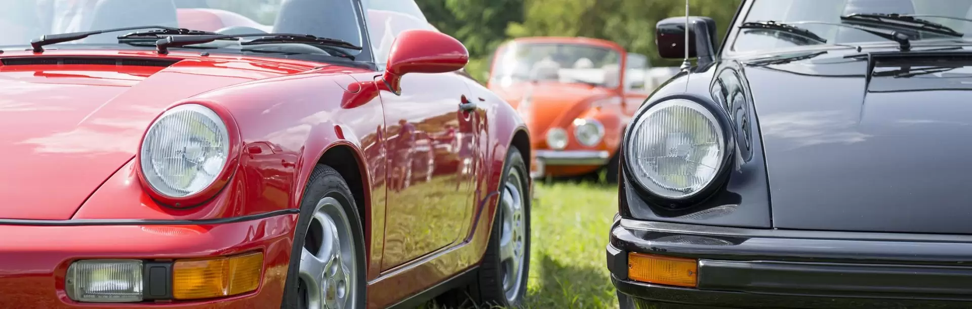 Line of Porsche classic cars